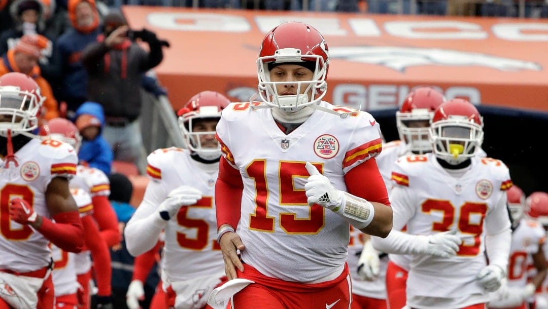 Kansas City Chiefs quarterback Patrick Mahomes (15) enters the field before an NFL football game against the Denver Broncos Sunday, Dec. 31, 2017, in Denver. (AP Photo/Joe Mahoney )