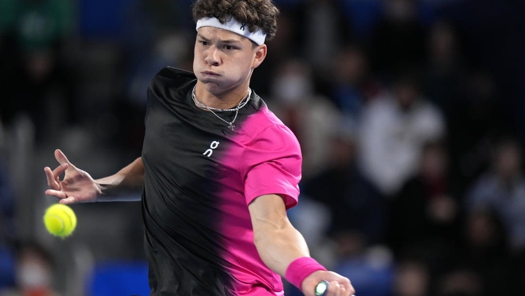 Ben Shelton of the U.S. hits a forehand return to Aslan Karatsev of Russia during the men's singles final of Japan Open tennis championships in Tokyo, Japan, Sunday, Oct. 22, 2023.