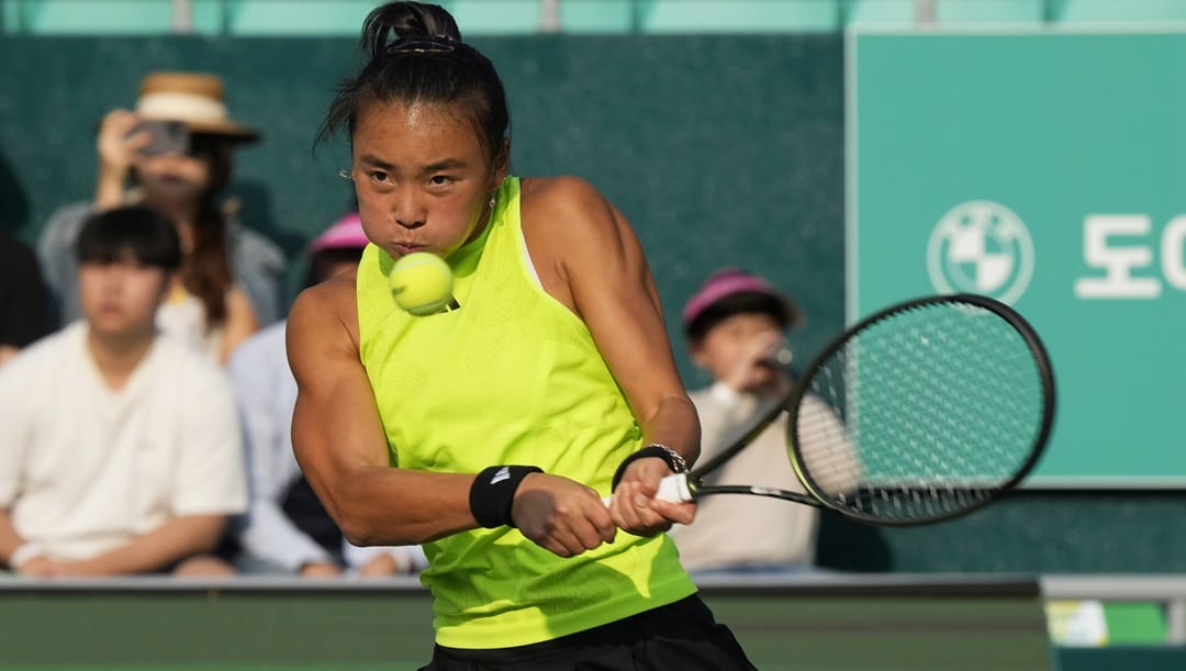 Yue Yuan of China returns a shot to Jessica Pegula of the United States during their final match of the Korea Open tennis championships in Seoul, South Korea, Sunday, Oct. 15, 2023.