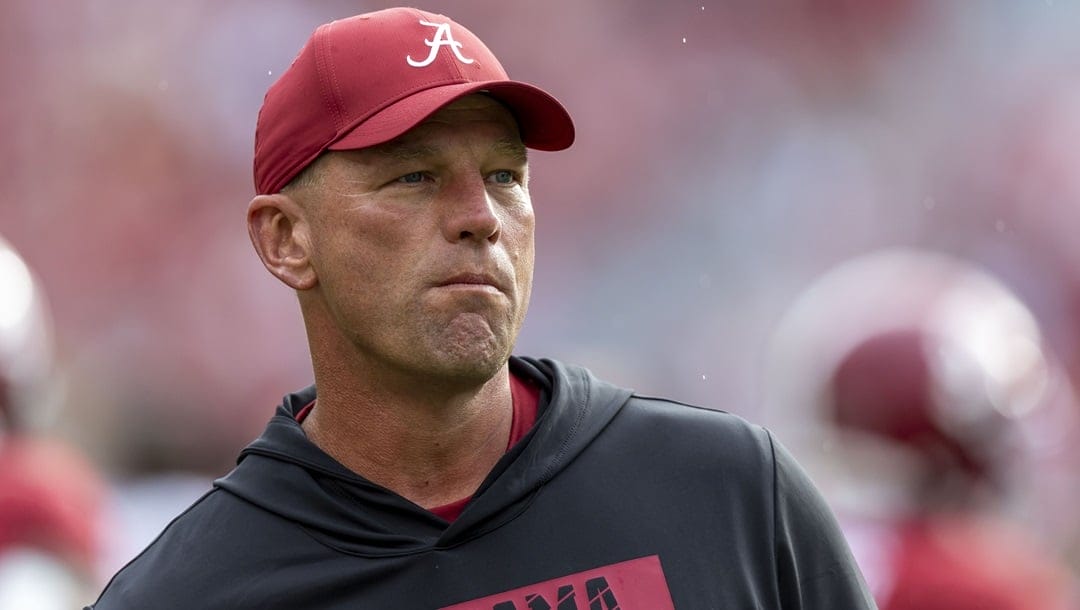 Alabama head coach Kalen DeBoer watches warm-ups before an NCAA college football game against Western Kentucky, Saturday, Aug. 31, 2024, in Tuscaloosa, Ala.