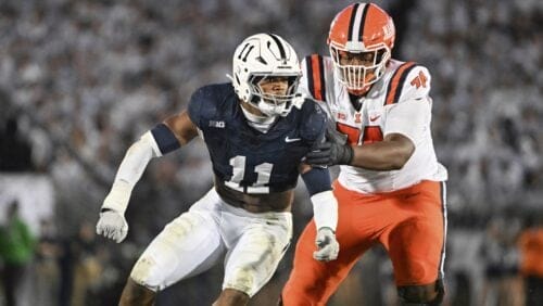 Penn State defensive end Abdul Carter (11) rushes past Illinois offensive lineman J.C. Davis (74) during the third quarter of an NCAA college football game, Saturday, Sept. 28, 2024, in State College, Pa.