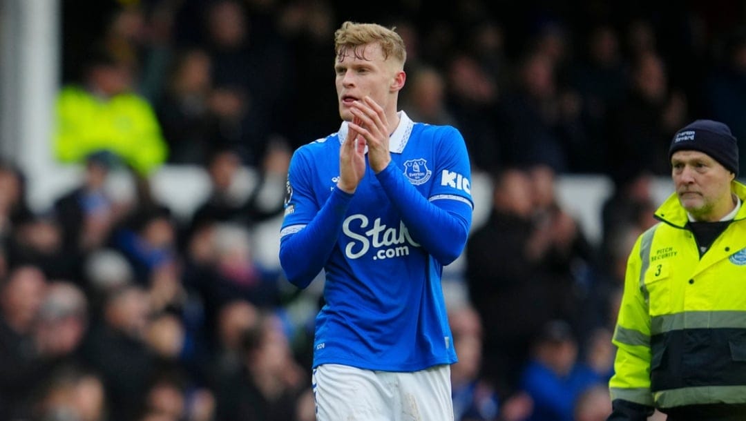 Everton's Jarrad Branthwaite applauds fans at the end of the English Premier League soccer match between Everton and Tottenham Hotspur, at the Goodison Park stadium, in Liverpool, England, Saturday, Feb. 3, 2024.