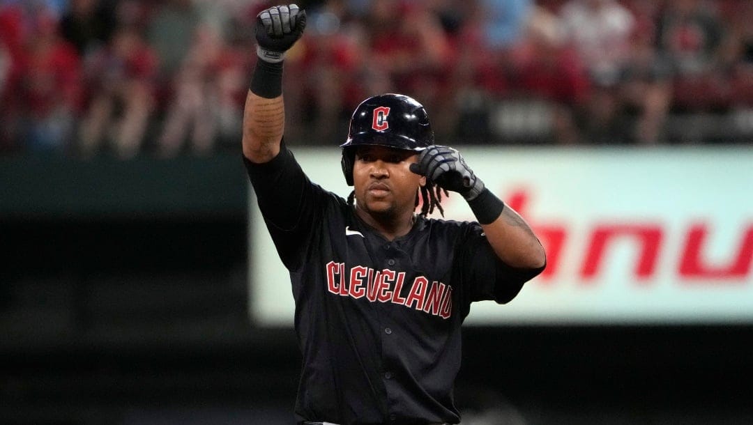 Cleveland Guardians' Jose Ramirez celebrates after hitting a double during the fourth inning of a baseball game against the St. Louis Cardinals Saturday, Sept. 21, 2024, in St. Louis.