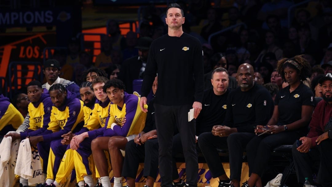 Head coach JJ Redick of the Los Angeles Lakers watches his team during the first quarter against the Minnesota Timberwolves at Crypto.com Arena on October 22, 2024 in Los Angeles, California.