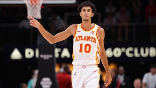 Zaccharie Risacher #10 of the Atlanta Hawks reacts after a three-point basket against the Indiana Pacers during the first quarter at State Farm Arena on October 08, 2024 in Atlanta, Georgia.