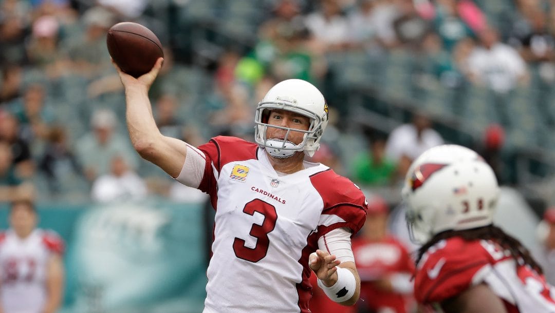 Arizona Cardinals' Carson Palmer throws during the second half of an NFL football game against the Philadelphia Eagles in Philadelphia.