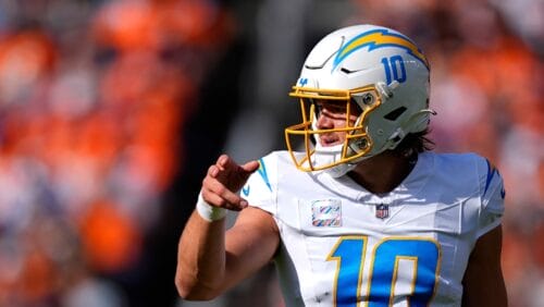 Los Angeles Chargers quarterback Justin Herbert (10) in the first half of an NFL football game Sunday, Oct. 13, 2024, in Denver. (AP Photo/David Zalubowski)