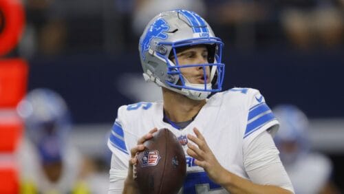 Detroit Lions quarterback Jared Goff (16) drops back to pass during an NFL football game against the Dallas Cowboys in Arlington, Texas, Sunday, Oct. 13, 2024. (AP Photo/Gareth Patterson)