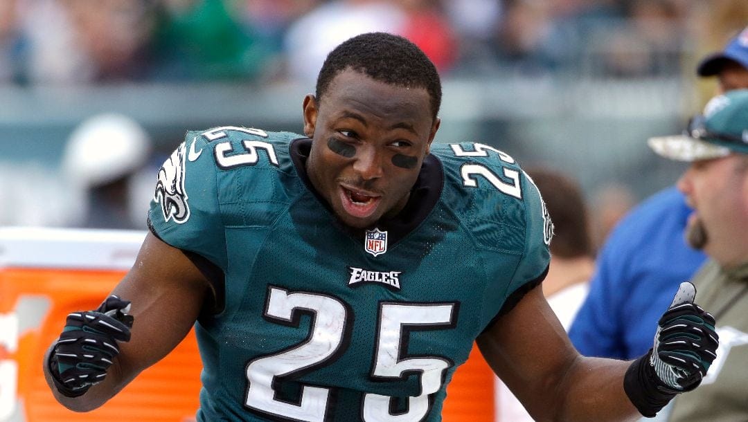 Philadelphia Eagles running back LeSean McCoy rallies his teammates on the bench during the second half of an NFL football game against the Washington Redskins in Philadelphia, Sunday, Nov. 17, 2013.