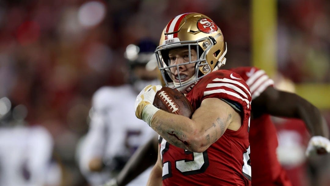 San Francisco 49ers running back Christian McCaffrey (23) runs against the Baltimore Ravens during the first half of an NFL football game Monday, Dec. 25, 2023, in Santa Clara, Calif. (AP PhotoJed Jacobsohn)