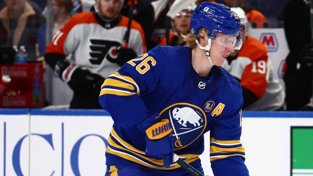 FILE - Buffalo Sabres defenseman Rasmus Dahlin carries the puck into the zone during the first period of an NHL hockey game against the Philadelphia Flyers, April 5, 2024, in Buffalo, N.Y. (AP Photo/Jeffrey T. Barnes, file)