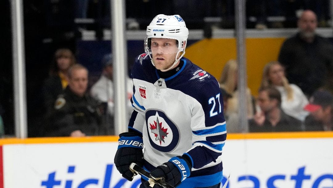 Winnipeg Jets' Nikolaj Ehlers (27) plays against the Nashville Predators during the second period of an NHL hockey game Tuesday, April 9, 2024, in Nashville, Tenn.