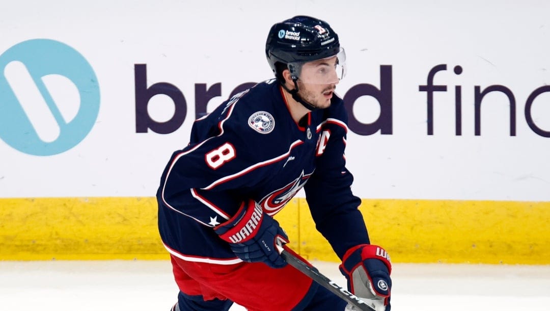 Columbus Blue Jackets defenseman Zach Werenski controls the puck against the Toronto Maple Leafs during an NHL hockey game in Columbus, Ohio, Tuesday, Oct. 22, 2024. The Blue Jackets won 6-2. (AP Photo/Paul Vernon)