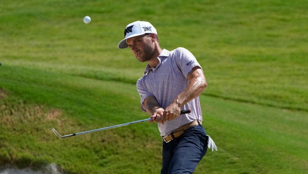 Eric Cole hits from the bunker on the 16th hole during the second round of the St. Jude Championship golf tournament Friday, Aug. 16, 2024, in Memphis, Tenn.