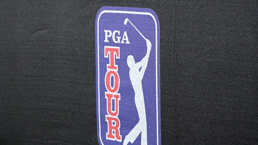 A PGA Tour logo is viewed at the 14th green during the first round of the Arnold Palmer Invitational golf tournament, Thursday, March 2, 2023, in Orlando, Fla.