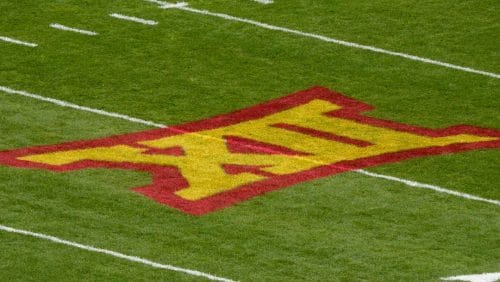 The Big 12 Conference logo is seen on the field before an NCAA college football game between Iowa State and West Virginia, Saturday, Nov. 5, 2022, in Ames, Iowa. (AP Photo/Charlie Neibergall)