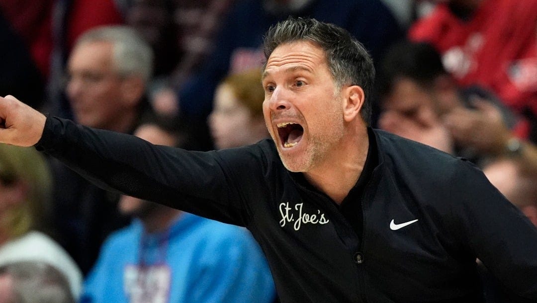 Saint Joseph's head coach Billy Lange yells during the first half of an NCAA college basketball game against Dayton, Tuesday, Feb. 6, 2024, in Philadelphia. (AP Photo/Matt Slocum)