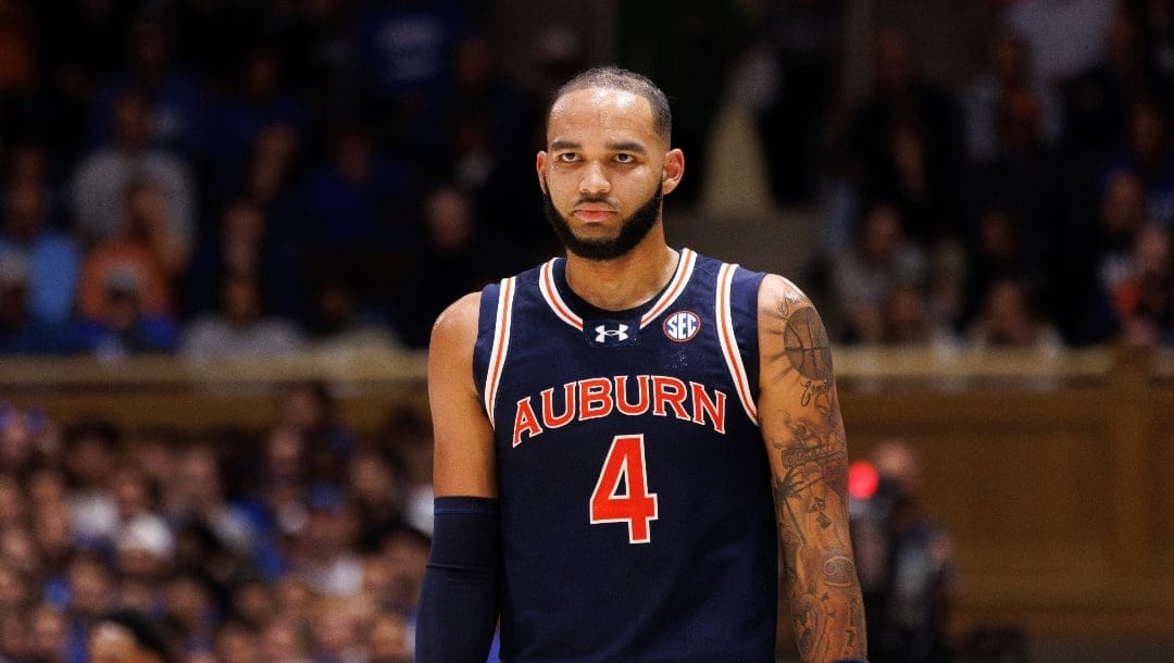 Auburn's Johni Broome (4) walks down the court during an NCAA college basketball game in Durham, N.C., Wednesday, Dec. 4, 2024. (AP Photo/Ben McKeown)