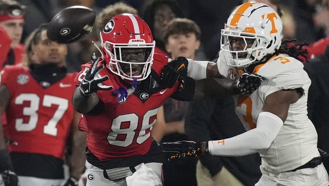 Georgia wide receiver Cole Speer (83) can not reach a pass as Tennessee defensive back Jermod McCoy (3) defends during the first half of an NCAA college football game, Saturday, Nov. 16, 2024, in Athens, Ga.