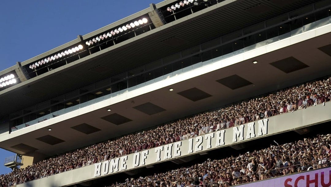 Fans cheer on the Aggies against Notre Dame during the first quarter of an NCAA college football game Saturday, Aug. 31, 2024, in College Station, Texas.