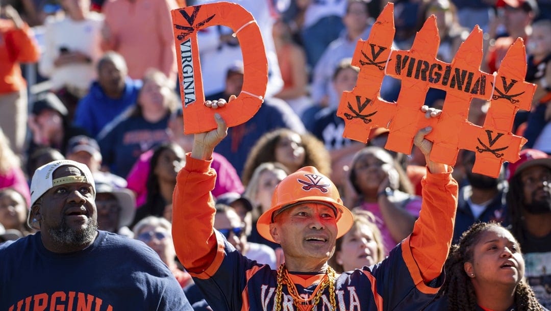 Virginia fans cheer on their team during an NCAA college football game against William & Mary, Saturday, Oct. 7, 2023, in Charlottesville, Va.