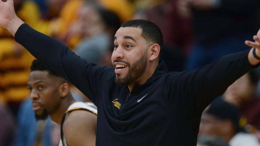 Loyola Chicago coach Drew Valentine gestures during the first half of the team's NCAA college basketball game against Dayton onFriday, March 1, 2024, in Chicago. Loyola won 77-72. (AP Photo/Paul Beaty)