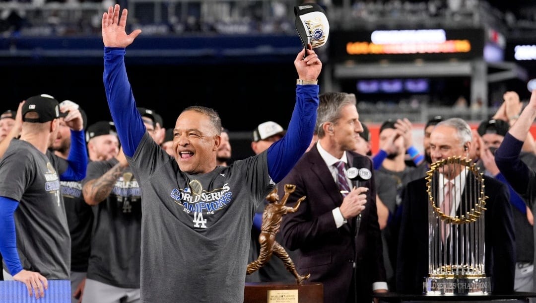 Los Angeles Dodgers manager Dave Roberts celebrates their win against the New York Yankees in Game 5 to win the baseball World Series, Thursday, Oct. 31, 2024, in New York.