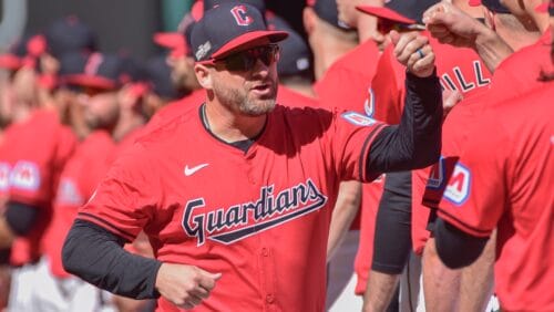 Cleveland Guardians manager Stephen Vogt, center, high fives his players during introductions before Game 1 of the AL Division Series against the Detroit Tigers Saturday, Oct. 5, 2024 in Cleveland.