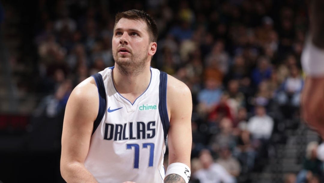 SALT LAKE CITY, UT - NOVEMBER 14: Luka Doncic #77 of the Dallas Mavericks shoots a free throw during the game against the Utah Jazz on November 14, 2024 at Delta Center in Salt Lake City, Utah. NOTE TO USER: User expressly acknowledges and agrees that, by downloading and or using this Photograph, User is consenting to the terms and conditions of the Getty Images License Agreement. Mandatory Copyright Notice: Copyright 2024 NBAE