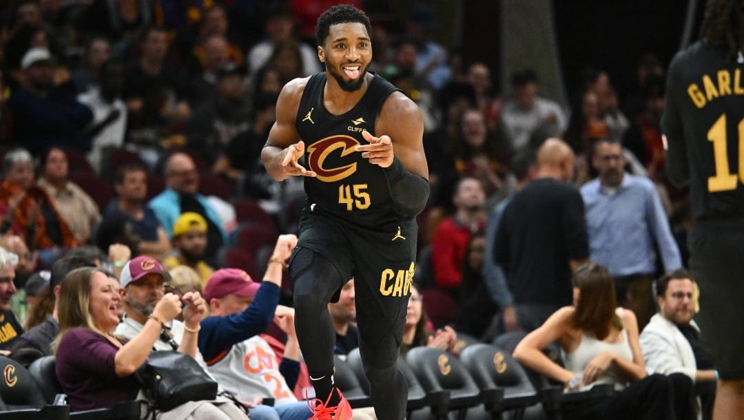 Donovan Mitchell #45 of the Cleveland Cavaliers celebrates after scoring during the third quarter against the Los Angeles Lakers at Rocket Mortgage Fieldhouse on October 30, 2024 in Cleveland, Ohio.