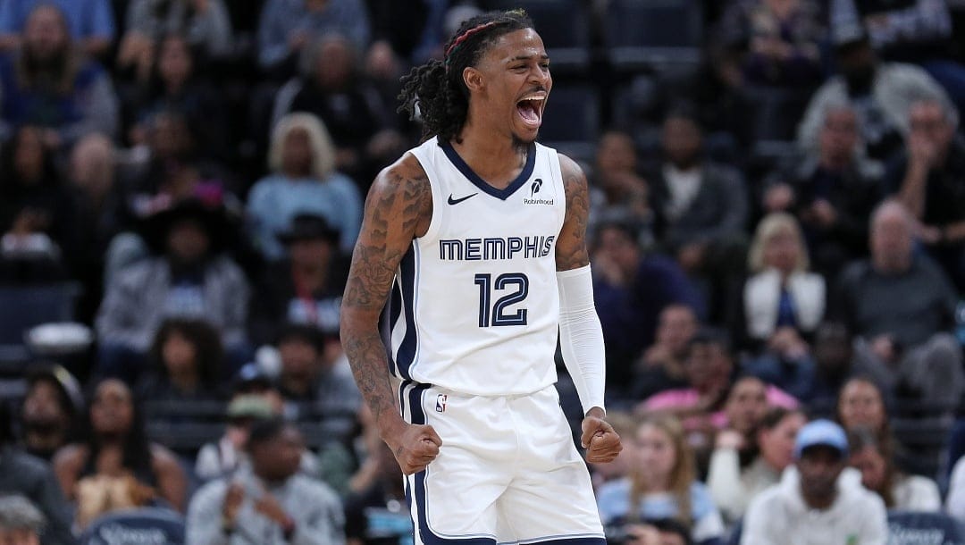 Ja Morant #12 of the Memphis Grizzlies reacts during the game against the Miami Heat at FedExForum on October 18, 2024 in Memphis, Tennessee.