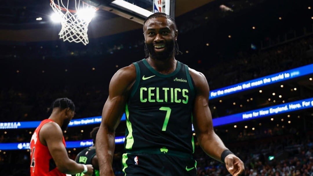 BOSTON, MA - NOVEMBER 16: Jaylen Brown #7 of the Boston Celtics smiles after being fouled going to the basket during the first quarter against the Toronto Raptors at TD Garden on November 16, 2024 in Boston, Massachusetts. NOTE TO USER: User expressly acknowledges and agrees that, by downloading and/or using this Photograph, user is consenting to the terms and conditions of the Getty Images License Agreement. (Photo By Winslow Townson/Getty Images)