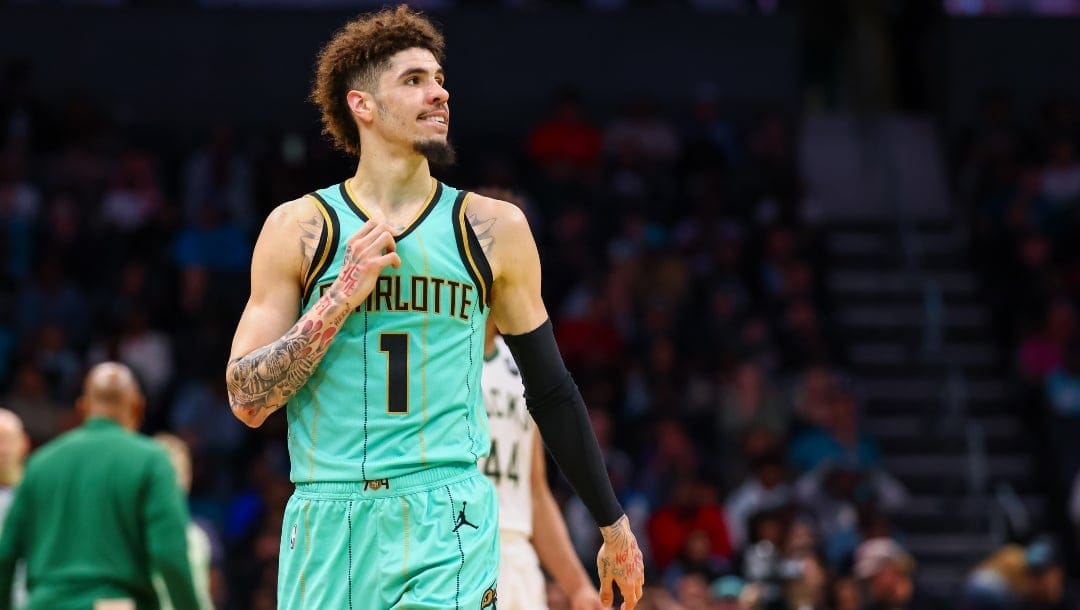 LaMelo Ball #1 of the Charlotte Hornets looks on during the second half of a basketball game against the Milwaukee Bucks at Spectrum Center on November 16, 2024 in Charlotte, North Carolina.