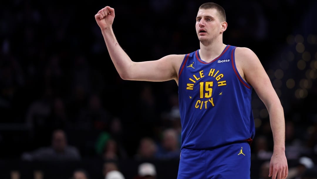 Nikola Jokic #15 of the Denver Nuggets celebrates against the Washington Wizards during the second half at Capital One Arena on January 21, 2024 in Washington, DC.