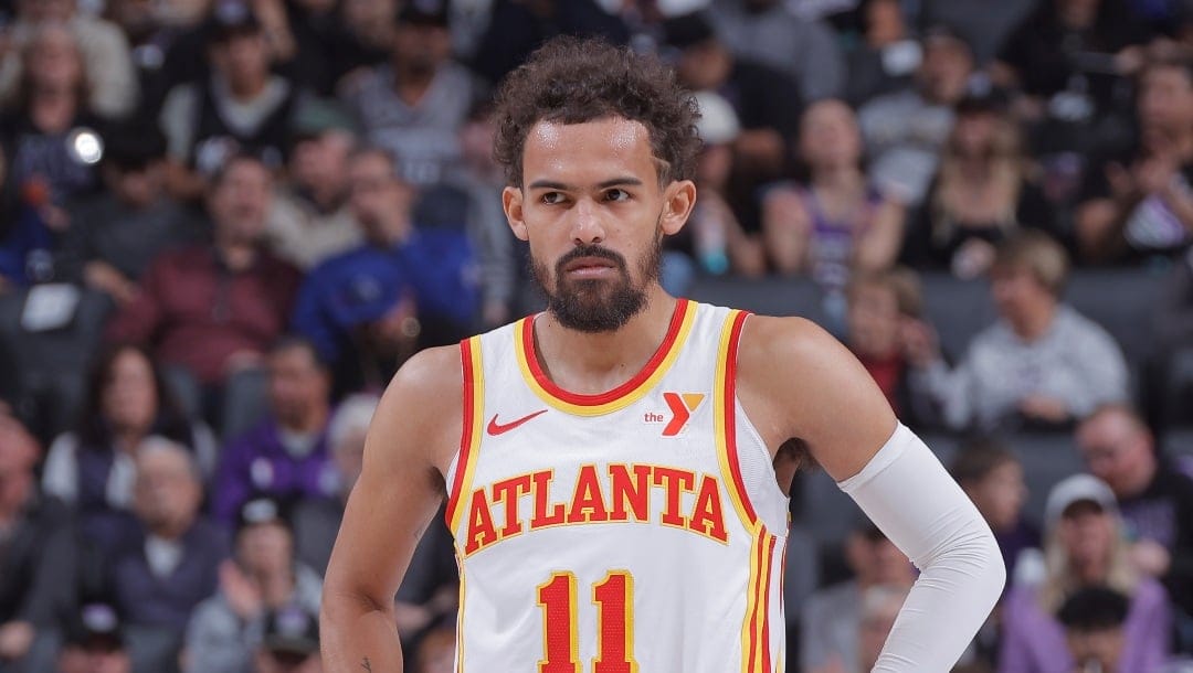 SACRAMENTO, CA - NOVEMBER 18: Trae Young #11 of the Atlanta Hawks looks on during the game against the Sacramento Kings on November 18, 2024 at Golden 1 Center in Sacramento, California. NOTE TO USER: User expressly acknowledges and agrees that, by downloading and or using this Photograph, user is consenting to the terms and conditions of the Getty Images License Agreement. Mandatory Copyright Notice: Copyright 2024 NBAE