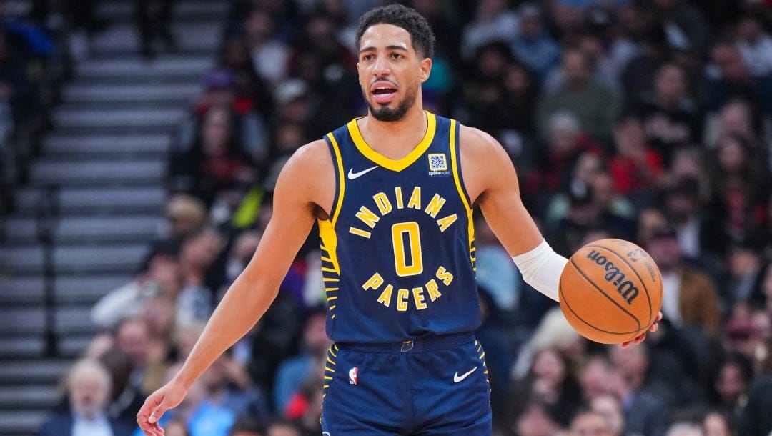 TORONTO, ON - NOVEMBER 18: Tyrese Haliburton #0 of the Indiana Pacers dribbles against the Toronto Raptors during the first half of their basketball game at the Scotiabank Arena on November 18, 2024 in Toronto, Ontario, Canada.