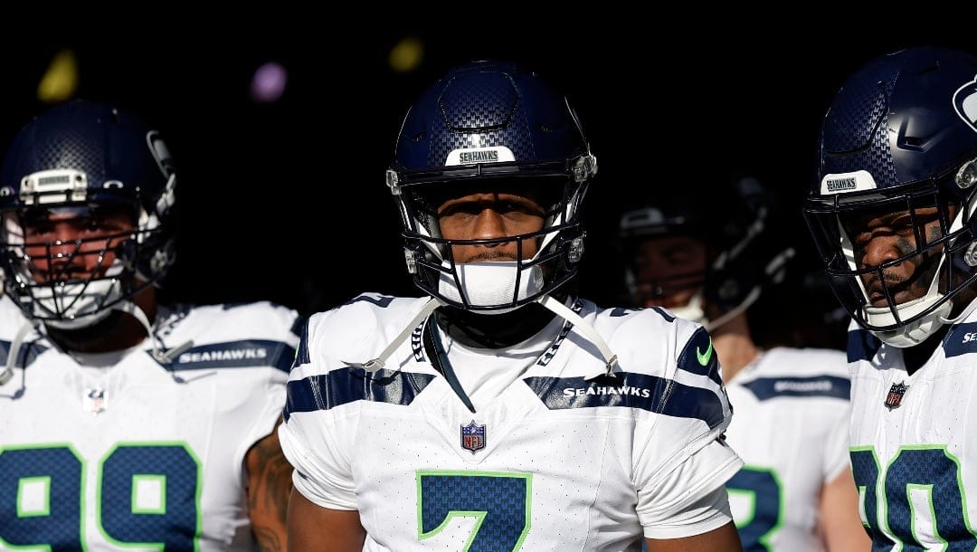 Seattle Seahawks quarterback Geno Smith (7) waits to take the field for an NFL football game against the New York Jets Sunday, Dec. 1, 2024, in East Rutherford, N.J. (AP Photo/Adam Hunger)