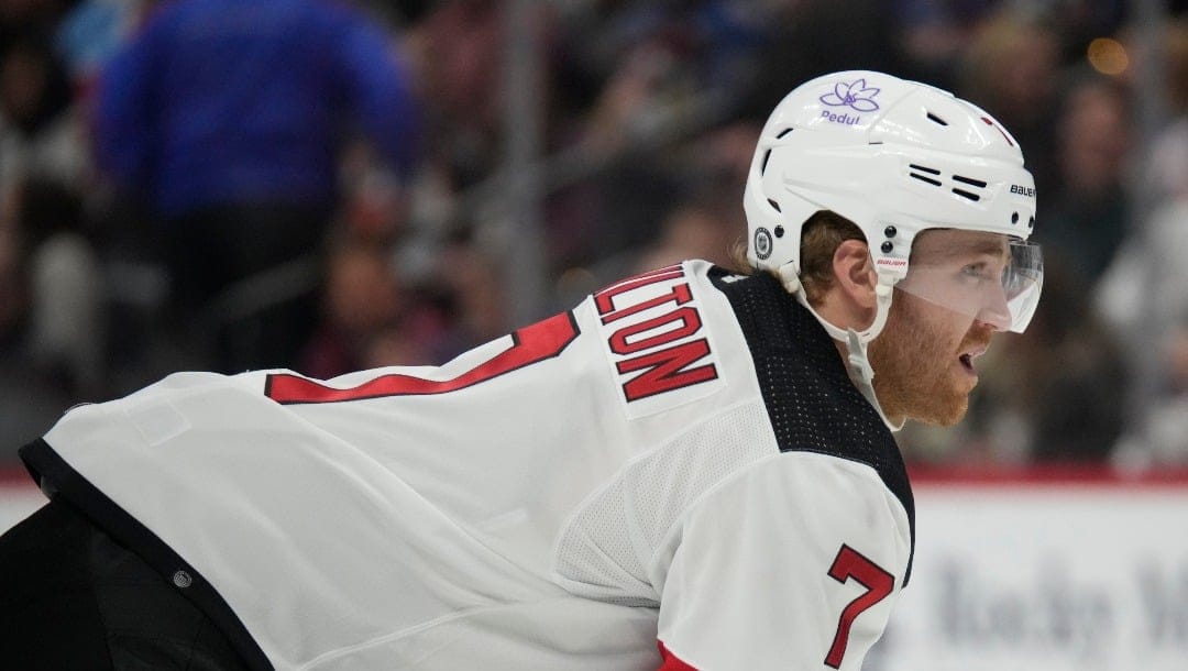 New Jersey Devils defenseman Dougie Hamilton (7) in the second period of an NHL hockey game on Tuesday, Nov. 7, 2023, in Denver. (AP Photo/David Zalubowski)