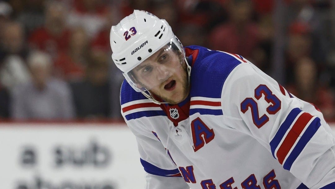 New York Rangers' Adam Fox (23) skates against the Carolina Hurricanes during the third period in Game 4 of an NHL hockey Stanley Cup second-round playoff series in Raleigh, N.C., Saturday, May 11, 2024. (AP Photo/Karl B DeBlaker)