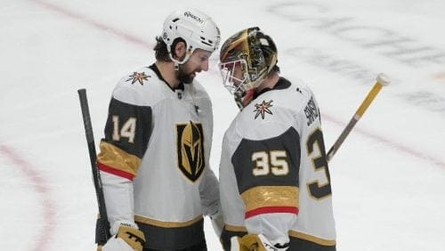 Vegas Golden Knights defenseman Nicolas Hague (14) celebrates with goaltender Ilya Samsonov (35) after an NHL hockey game against the San Jose Sharks in San Jose, Calif., Tuesday, Jan. 7, 2025.