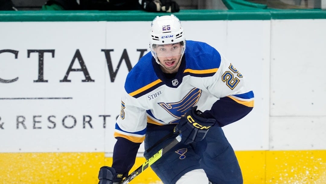 St. Louis Blues center Jordan Kyrou looks to make a pass during an NHL hockey game against the Dallas Stars in Dallas, Wednesday, April 17, 2024. (AP Photo/Tony Gutierrez)