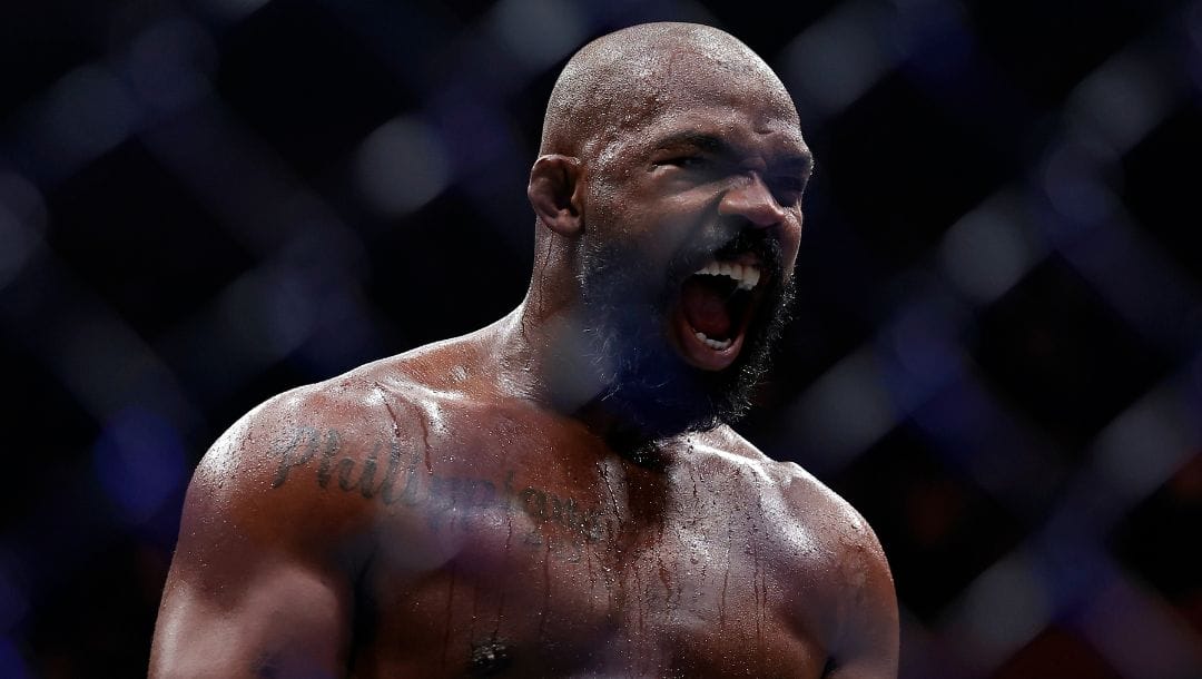 Jon Jones reacts after defeating Stipe Miocic in a UFC 309 mixed martial arts heavyweight title bout, early on Sunday, Nov. 17.