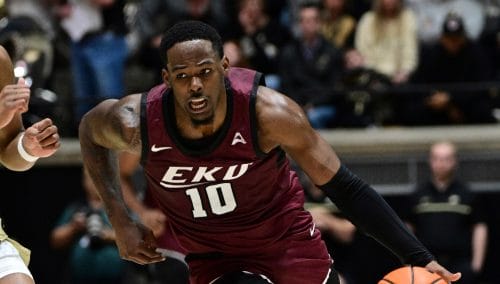 Eastern Kentucky forward Devontae Blanton (10) runs the ball around Purdue guard Myles Colvin during the first half of an NCAA college basketball game, Friday, Dec. 29, 2023, in West Lafayette, IN. (AP Photo/Marc Lebryk)