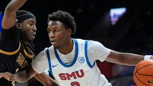 SMU guard Boopie Miller dribbles against Alabama State guard Shawn Fulcher during the first half of an NCAA college basketball game, Tuesday, Dec. 3, 2024, in Dallas. (AP Photo/LM Otero)