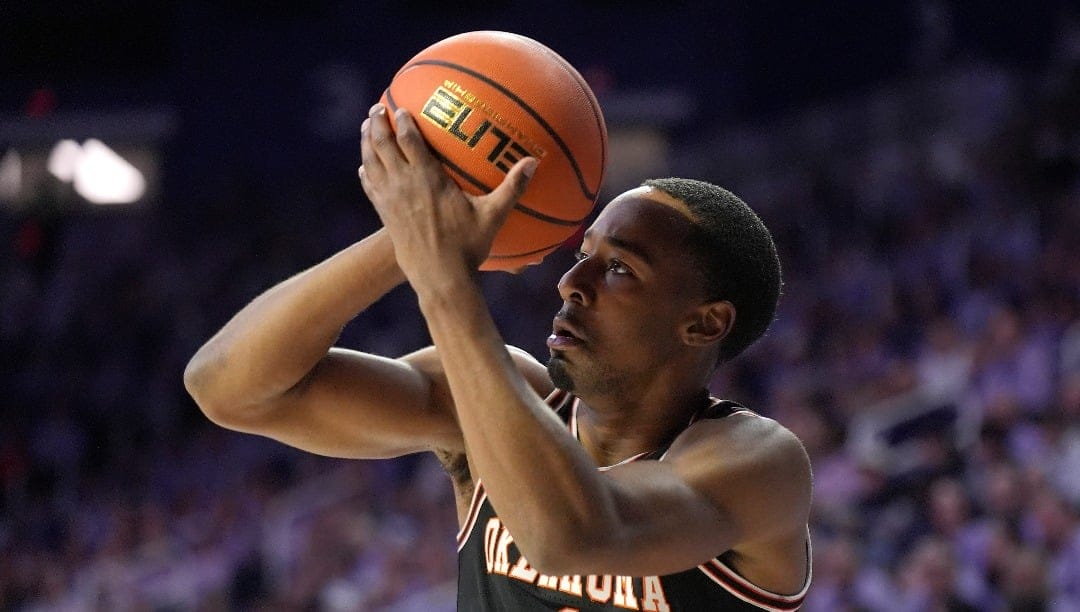 Oklahoma State guard Bryce Thompson shoots during the first half of an NCAA college basketball game against Kansas State Saturday, Jan. 20, 2024, in Manhattan, Kan. (AP Photo/Charlie Riedel)