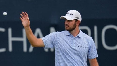 Paatrick Cantlay catches a ball tossed by his caddie on the 11th hole during the second round of the BMW Championship golf event at Castle Pines Golf Club, Friday, Aug. 23, 2024, in Castle Rock, Colo. (AP Photo/Matt York)