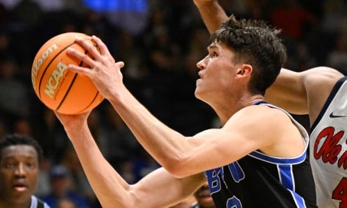 BYU guard Egor Demin (3) drives to the basket past Mississippi forward Jaemyn Brakefield (4) during the second half of an NCAA college basketball game Thursday, Nov. 28, 2024, in San Diego. (AP Photo/Denis Poroy)