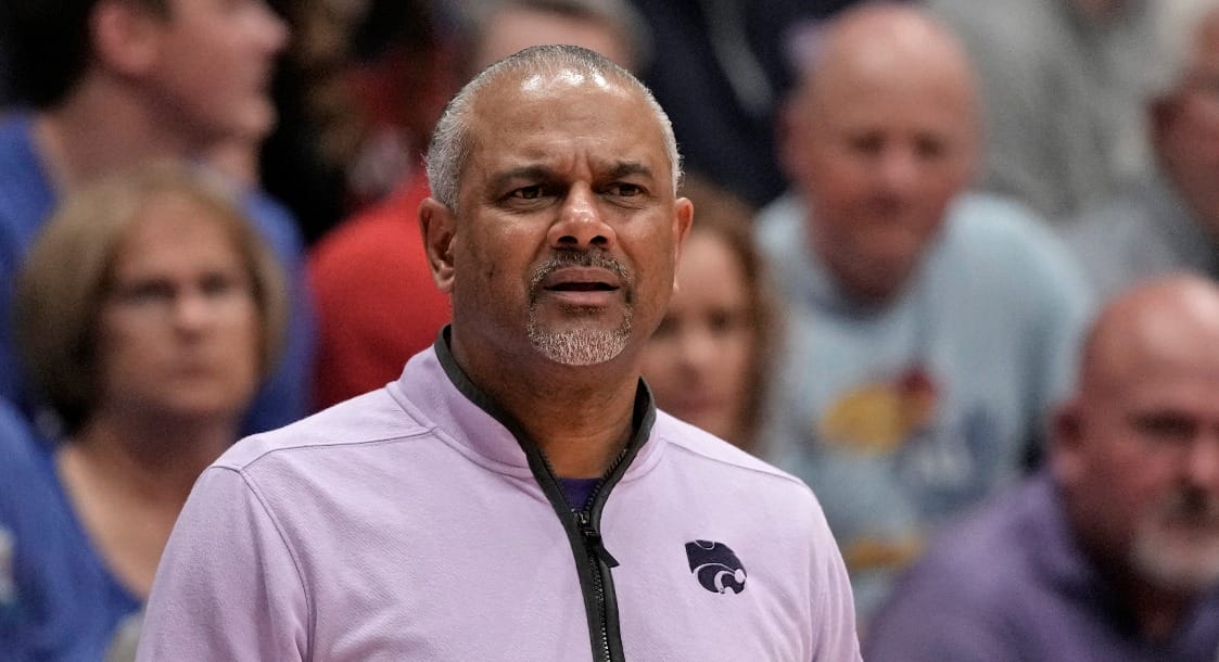 Kansas State head coach Jerome Tang watches during the second half of an NCAA college basketball game against Kansas State Tuesday, March 5, 2024, in Lawrence, Kan. Kansas won 90-68. (AP Photo/Charlie Riedel)