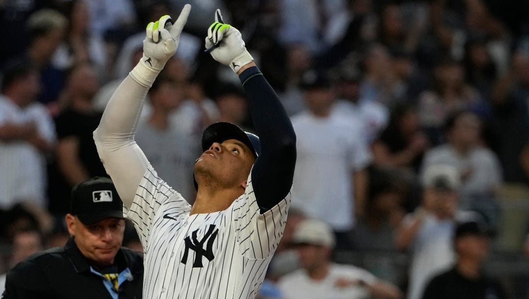 New York Yankees' Juan Soto celebrates after hitting a home run during the third inning of a baseball game against the New York Mets, Wednesday, July 24, 2024, in New York.