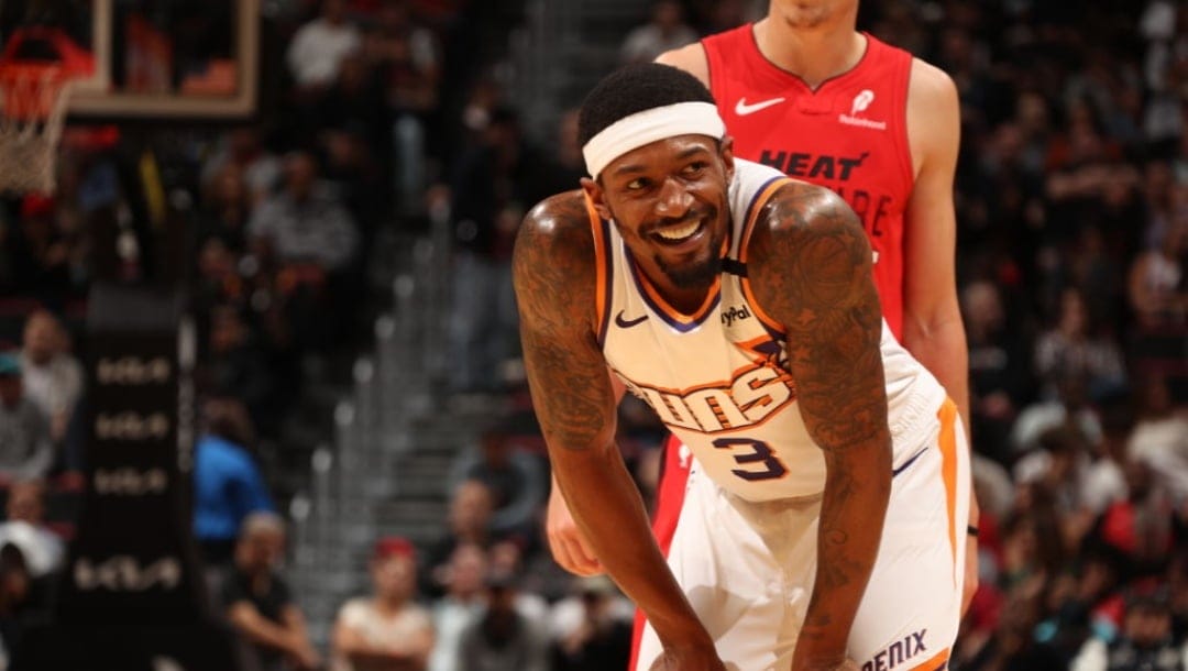 MIAMI, FL - DECEMBER 7: Bradley Beal #3 of the Phoenix Suns smiles during the game against the Miami Heat on December 7, 2024 at Kaseya Center in Miami, Florida. NOTE TO USER: User expressly acknowledges and agrees that, by downloading and or using this Photograph, user is consenting to the terms and conditions of the Getty Images License Agreement. Mandatory Copyright Notice: Copyright 2024 NBAE